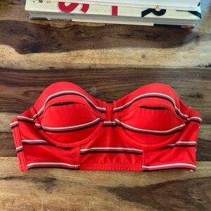 Out from under strapless bikini top